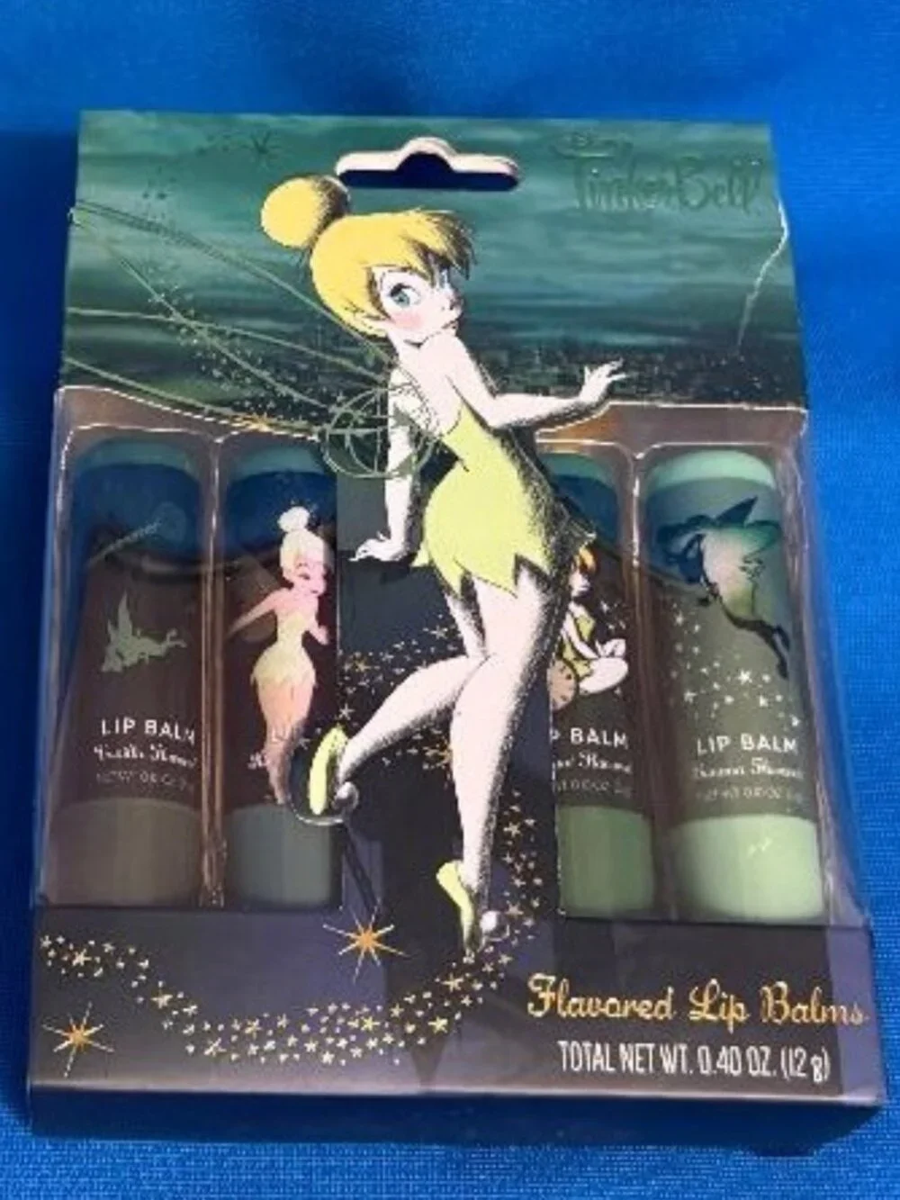 DISNEY TINKER BELL 4 PACK FLAVORED LIP BALMS VANILLA BANANA COCONUT & KIWI MELON